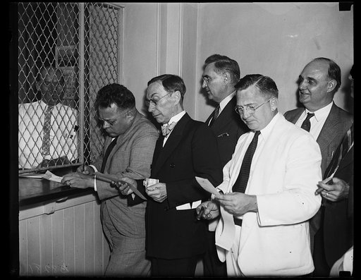 Rarin' to go. These members of Congress don't want to waste any time buying railroad tickets after Congress adjourns. Here they are at the Capitol ticket office buying what it takes to get away from Washington quickly From the left, Representative Maury Mavrick, of Tex.; J. Burwood Daly of Pa.; Samu