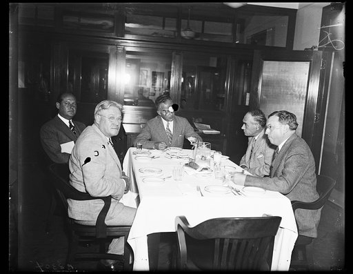 At C of C meeting. David R. Edwards, Boston, vice president of the U.S. Chamber of Commerce, left, and Lee J. Dougherty, Davenport, Iowa, photographed at the buffet luncheon which served as an intermission at the Chamber Council of War on New Deal legislation. 9/20/35