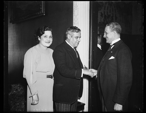 Host at embassy reception. Madam Castillo Najera and Ambassador Castillo Najero of Mexico, left, greet Minister Ricardo J. Alfaro of Panama, at the reception held at the Mexican Embassy. 10/21/35