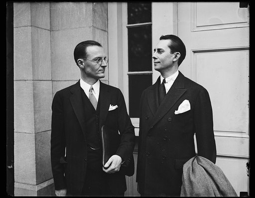 Half a victory. W.D. Whitney, Counsel, left, and James Walter Carter, right, President of Carter Coal Co., leave District of Columbia Supreme Court with half a victory in their fight against the Guffey Coal Act. A temporary injunction restraining stockholders of the coal company from complying with 