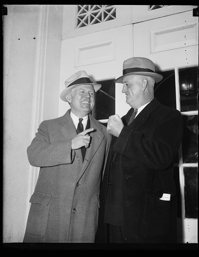 Legion invites Roosevelt. John Thomas Taylor, left, lobby leader of the American Legion, and Ray Murphy, new National Commander, call on President Roosevelt and make arrangements for the president to deliver an Armistice day address at Arlington National Cemetary. 10/25/35