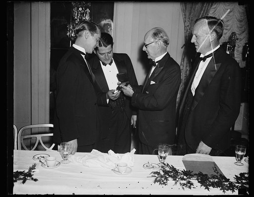 L to r: Franchot Tone, Jerry Tone, brother, Dr. Frank Tone, Niagra Falls [i.e. Niagara Falls] receiving Acheson Award