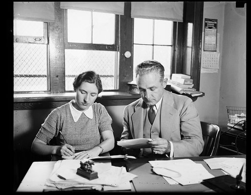 East meets west. Mary E. Rundlett, new Secretary for Coach Dutch Bergman at Catholic University, is accustomed to working with football coaches. She held such a position at the University of Pregon, Eugene, Oreg. for seven years. Coach Bergman's footballers are rated highly, among the first ten of t