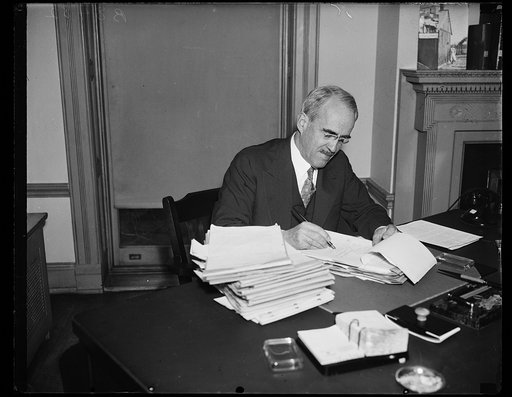Starts electric ball rolling. Morris L. Cooke, head of Rural Electrification Administration, puts his approval on seven rural projects which will place electricity in about 7,000 [...] farm [...] homes at a cost of $1,274,000. These homes, in the most part, have never been lighted by electricity. Th