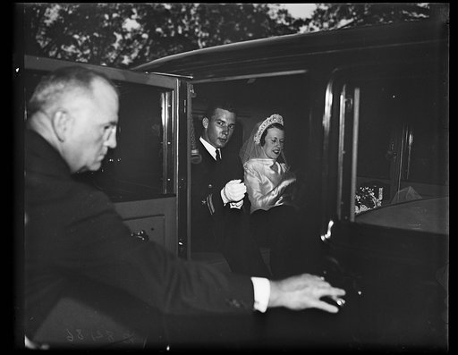James-Brainard wedding. Lt. and Mrs. George Shearman James, Jr., photographed following their marriage at Washington. The bride is the daughter of Capt. and Mrs. Roland Munroe Brainard, U.S.N., and the bridegroom is the son of Mr. and Mrs. G.S. James. 11/2/35