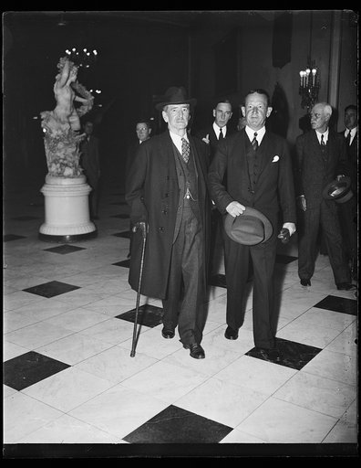 Sec. Claude Swanson, L., with Naval aide