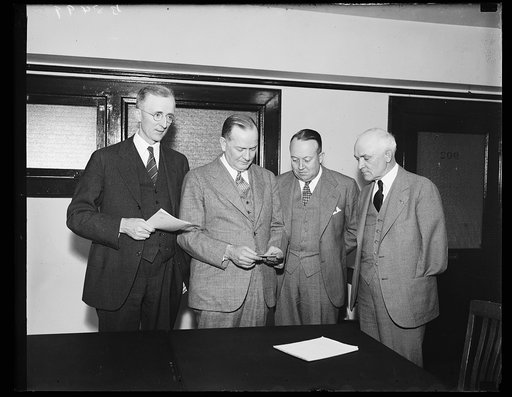 Walter H. [Malerney?], C.E. Smith, George F. Acret, and Percy [Tetlin?], members of Bituminous Coal Commission