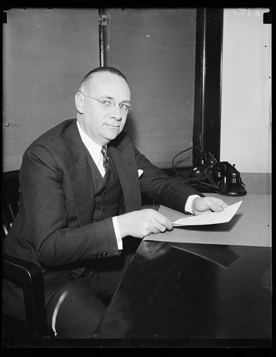 Chairman of Coal Commission. Chairman Charles F. Hosford, Jr., of the Bituminous Coal Commission, photographed at his desk where he is making a determined fight against the "Interests" trying to prevent coal producers from cooperating. 10/26/35