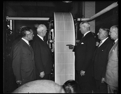 First RU[...] Opening the first run of the Michigan centennial stamp of which there will be 65,000,000. The run will be started in Michigan on the first of November. The opening was attended by Postmaster General James A. Farley, Orville Atwood, Secretary of state of Michigan, and L.W. Roberts, assi