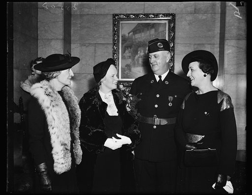 The big four. These leaders in legion activities photographed prior to President Roosevelt's address at the Tomb of the Unknown Soldier. From the left: Gwendolyn McDowell, National Secretary of the Auxiliary; Mrs. Melville Mucklestone, National President of the Auxiliary; Ray Murphy, National Comman
