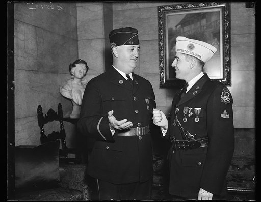 L to r: Ray Murphy, Natl. Pres. Am. Leg.; Joseph J. Malloy, Dept. Com.