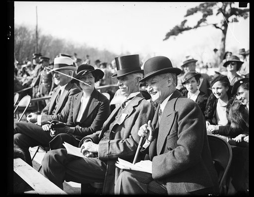 Wash. D.C. Watching their show. Melvin Hazen, left, District Commissioner, and Ambassador Manuel Truceo of Chile, watching the Inter- American Horse Show at which the Chilean team made a fine showing. Hazen played an important part in bringing the show to Washington. 10/26/35