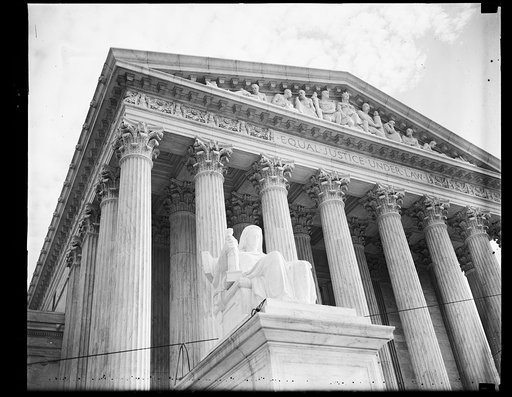 Wash. D.C. New statue at Supreme Court is placed. This is the first photograph of the new statue, sculptored by James E. Frazier of New York, after it was placed. 11/6/35