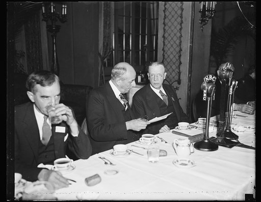 Wash. D.C. Gonna make a speech. Attorney General Homer S. Cummings, left, prepares to address the U.S. Conference of Mayors in session here today. He is shown with Mayor Fred W. Mansfield of Boston. 11/18/35