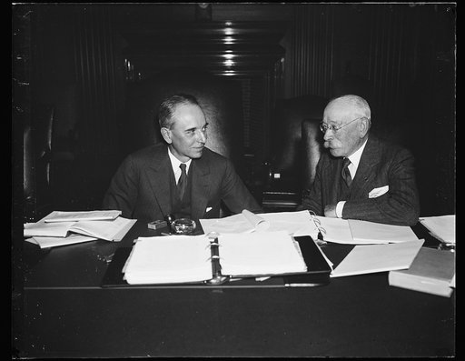 First pictures in new Supreme Court shows advisors. Exclusive: this is the first picture to be made of an official meeting of any legal body in the new U.S. Supreme Court. It shows William D. Mitchell, left, former attorney general, and George W. Wickersham, as they met with a group as appointed as 
