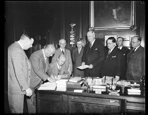 Bessie Donaldson, Deputy and Asst. Postmaster, Wm. E. Slattery, Comp. of Post Off. Dept., A.H. Gilbert, Chief Asst. of Post Off., John E. Lammel, Director of [...] Post Office, [...] Postmaster James Farley, Wm. W. Hoover, [...] Postmaster, [...