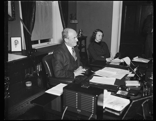 Firm financeer. Sec. Henry Morgenthau, Jr., photographed at a press conference where he answered questions concerning the pending financing. Among other things, the administration says that the carrying-charge on the bonded debt of the United States has been reduced materially under the leadership o