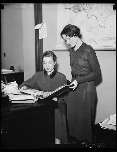A pair of Portias. These two young women are the latest addition to the legal staff at the Federal Communications Commission. Mary Elizabeth Erickson, left, recently of Washington State, is assigned to the broadcast section of the legal department, and Violet Lowry, of Hot Springs, Ark., is in the T