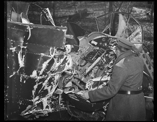 Army fliers killed in sight of Capitol. Two U.S. Air Corps fliers, Maj. George E. Rice and Lieut. Harry H. Geoffrey, were killed in this airplane crash when the ship they were flying was swept into a hillside by a gust of wind as a landing was attempted oon Bolling field, Washington, D.C. The fliers