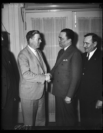 J. Edgar Hoover, center