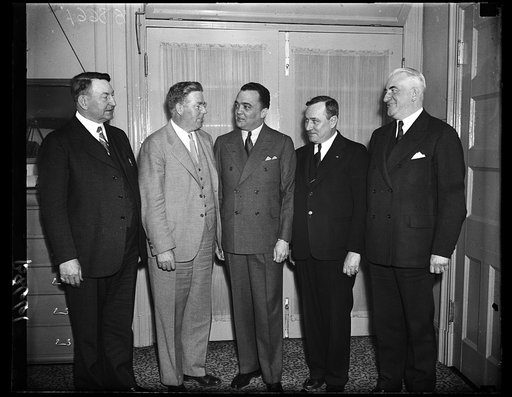 J. Edgar Hoover, center