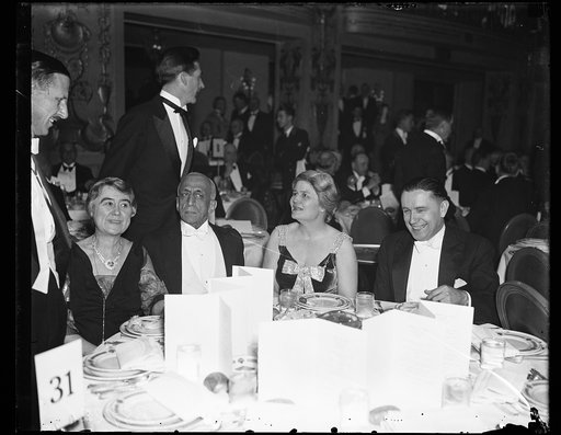 Group at table; Josephine Roche, center