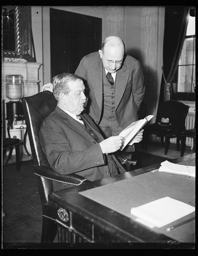 Ellison D. Smith at desk