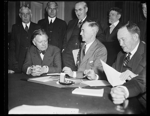 William E. Borah, front left; Joseph T. Robinson, right