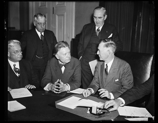 Hiram Johnson? left; William E. Borah, center