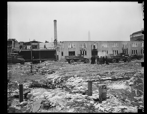Building demolition site; Washington Monument in background. Washington, D.C.