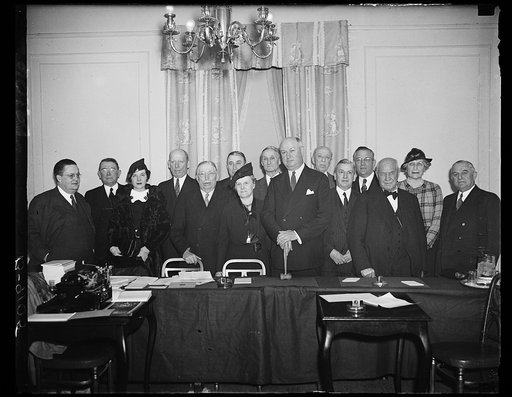 Group: William Gibbs McAdoo and James Farley, center