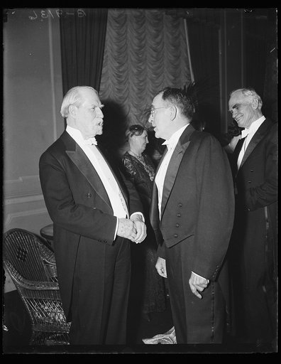 Charles Evans Hughes, left; Joseph Byrns in back, right