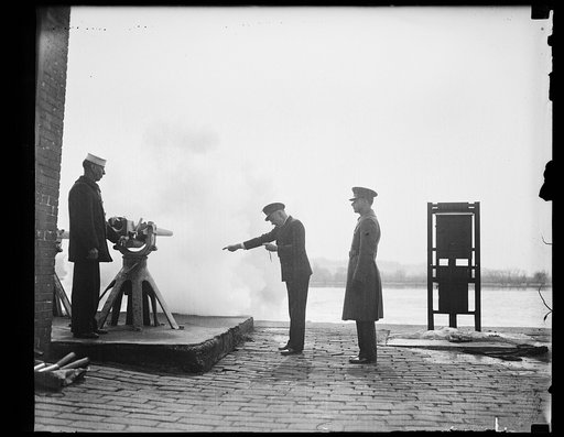 Navy gun at waterfront