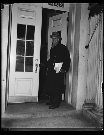 Man at door of White House, Washington, D.C.