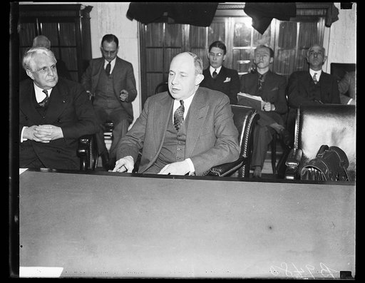 James J. Davis, left