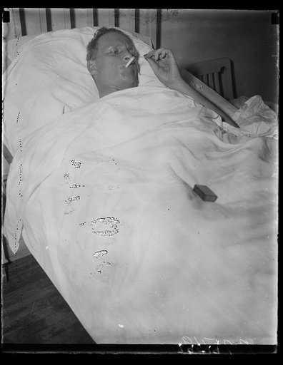 Man in hospital bed