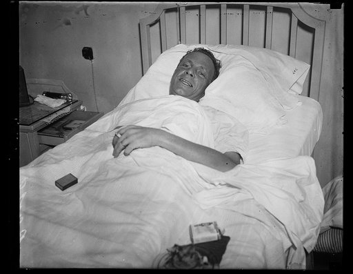 Man in hospital bed