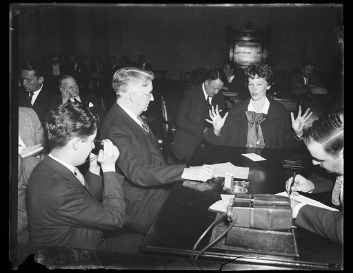 Royal S. Copeland, left; Amelia Earhart, right