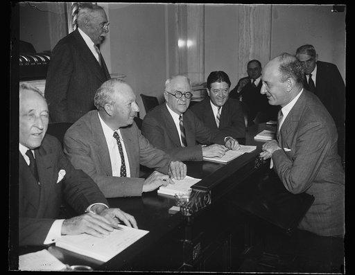 Pat Harrison, 2nd from left; Robert M. La Follette, Jr., 2nd from right, Henry Morgenthau, right