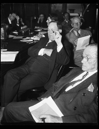 Joseph T. Robinson, center