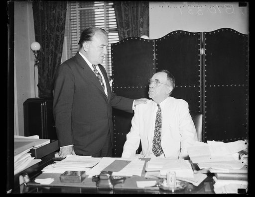 William B. Bankhead at desk