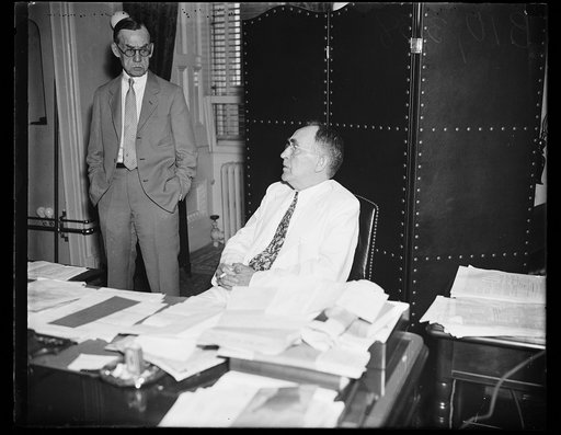 William B. Bankhead at desk
