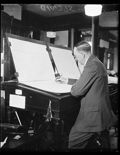 Man creating weather maps