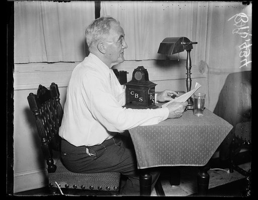 George Norris at CBS microphone
