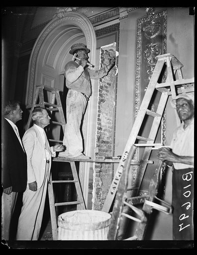 Man working on plaster wall