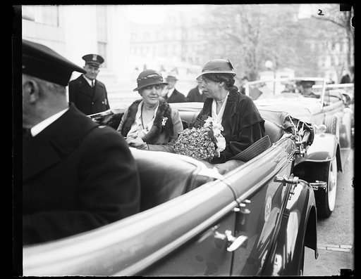 Eleanor Roosevelt, right, in automobile