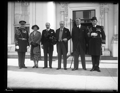 CANADIAN PRIME MINISTER ARRIVES AT WHITE HOUSE. PRIME MINISTER RICHARD B. BENNETT OF CANADA, ARRIVED AT THE WHITE HOUSE TODAY TO TAKE PART IN THE DISCUSSIONS ON THE COMPLICATED FOREIGN EXCHANGE PROBLEM. IN THE PHOTOGRAPH, L TO R: COL. JAMES ULIO, MILITARY AIDE; MRS. WILLIAM D. HERRIDGE, WIFE OF THE 