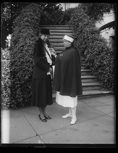 Eleanor Roosevelt receiving Red Cross pin. White House, Washington, D.C.