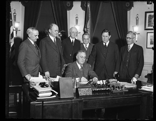 PRESIDENT SIGNS GOLD BILL