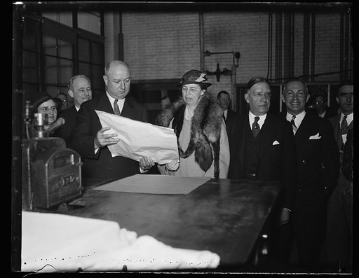 FIRST LADY SEES FIRST MOTHERS DAY STAMP PRINTED. Mrs. Roosevelt was the guest of honor at a ceremony in the stamp section of the Bureau of Engraving & Printing when the first sheets of the new Mother's Day commemorative issue were passed through the press. Photo shows from left to right; Mrs. Henry 